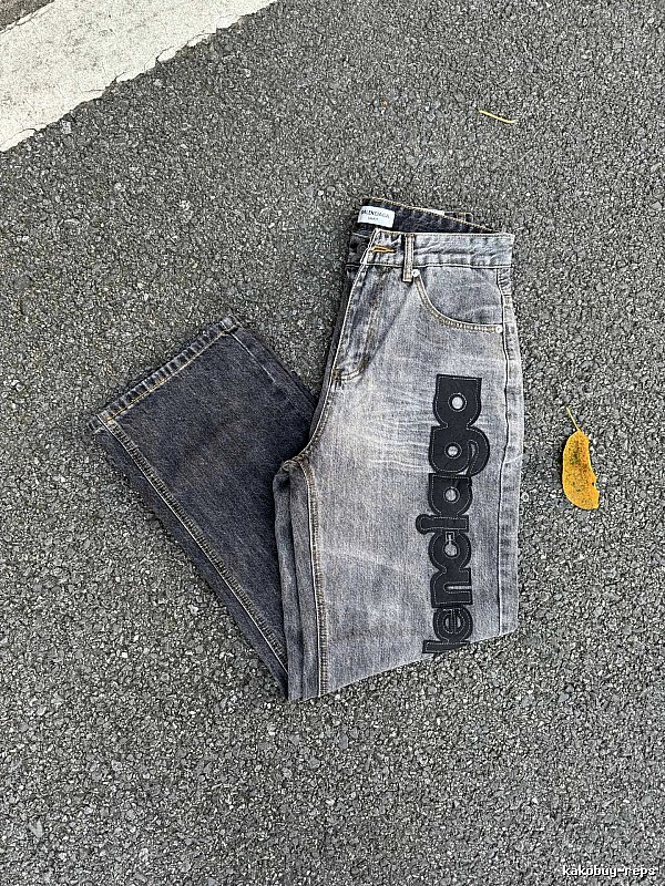 Balenciaga Logo Jeans with large side script branding and a faded leg in Gray Wash
