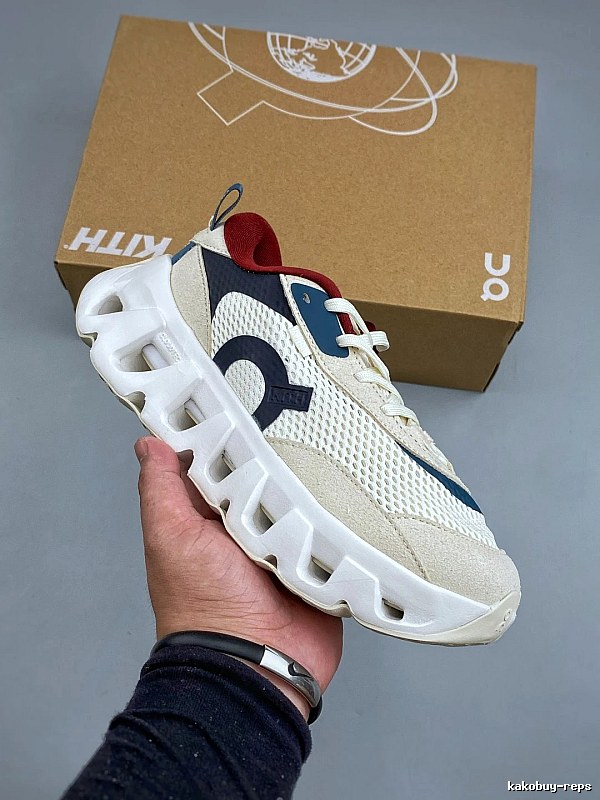 On Cloud Runners in Cream and Navy, Finished with Segmented Sole Pods